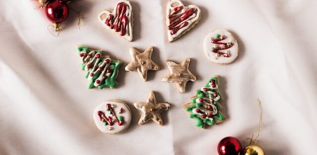 A handful of colorful Christmas cookies.